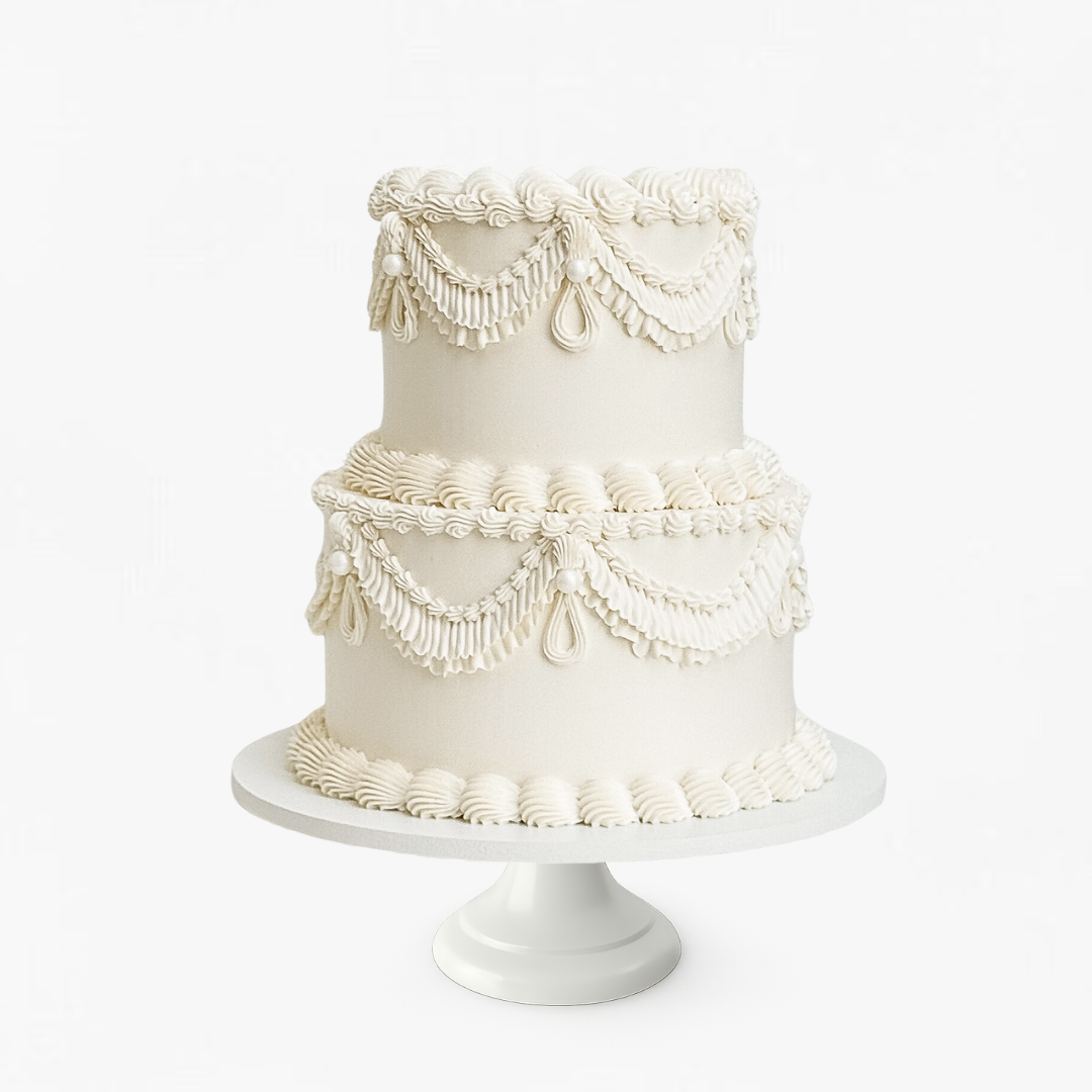 Two-tiered white cake - wedding cakes Sydney