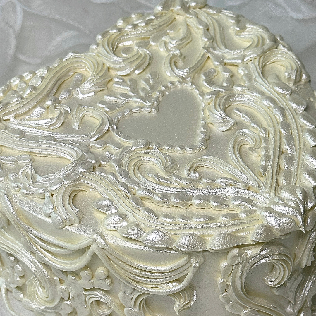 Close up of detailed gender reveal cake