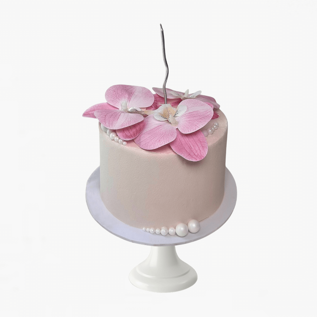 Pink-toned buttercream cake with piped orchids and vintage borders – custom cakes Sydney