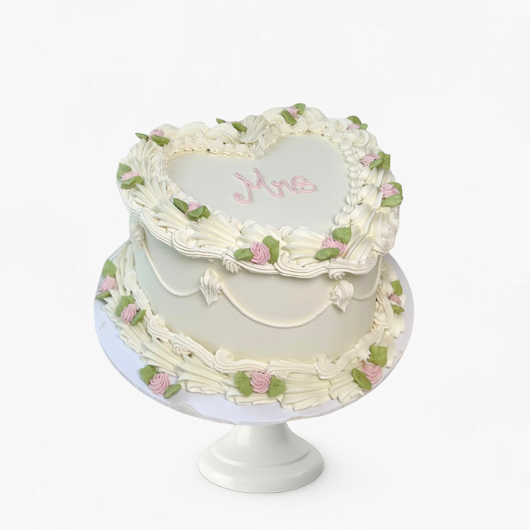 White vintage heart cake with floral designs - engagement cakes Sydney